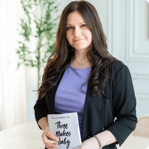 Delia Petrescu holding a book on fertility
